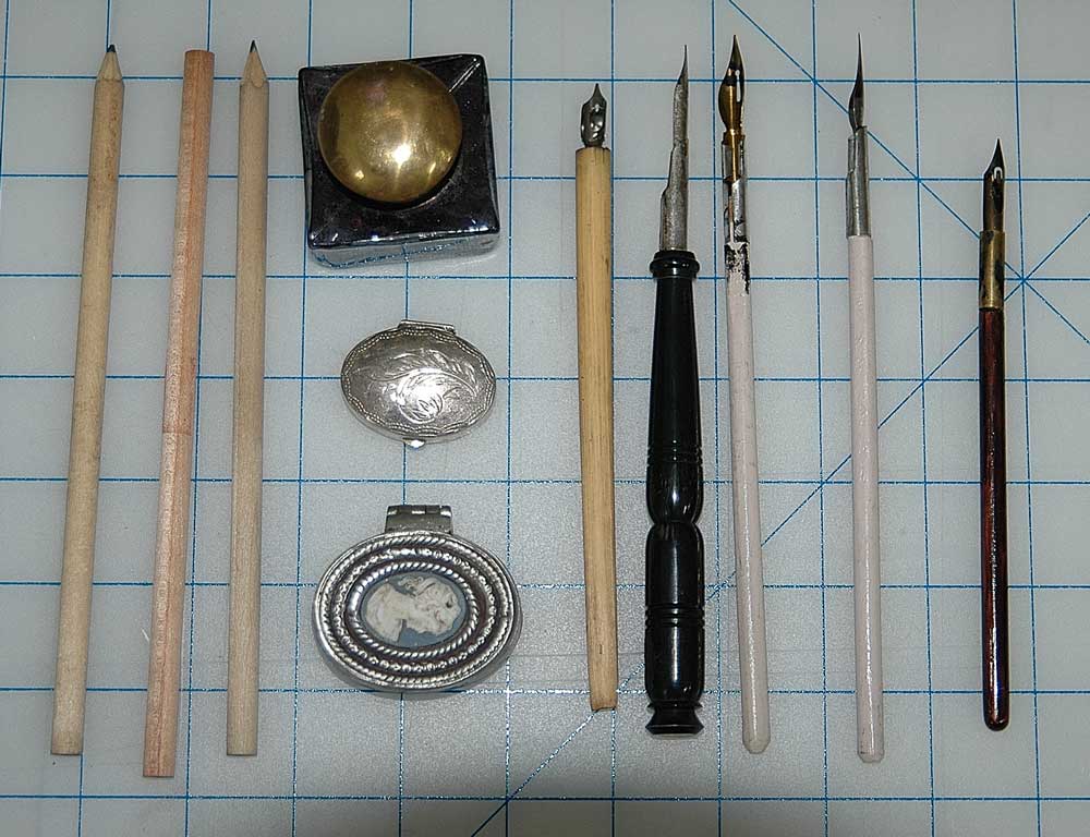 Various Writing Implements & Inkwells